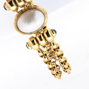 Bracciale in oro con perla mabè e zaffiri Bracciale in oro con perla mabè e zaffiri