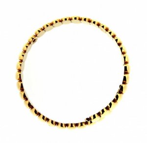 Bracciale rigido in oro giallo con ovalini lucidi Bracciale rigido in oro giallo con ovalini lucidi